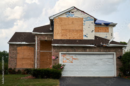 Tornado Damaged Single Family Home;  Hail Damaged Home; Boarded-up Single Family Home; Wind Damage House