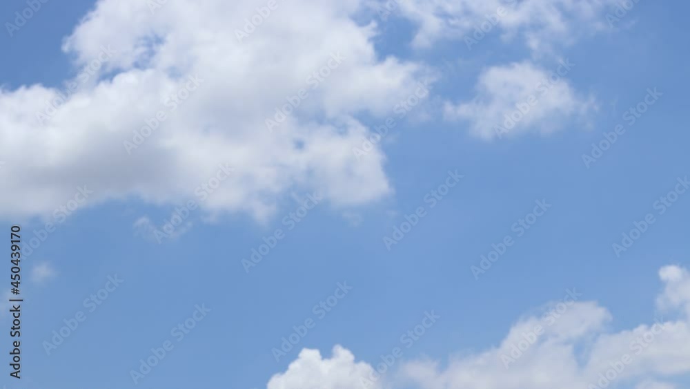 Blue sky white clouds. Puffy fluffy white clouds. Cumulus cloud cloudscape timelapse. Summer blue sky time lapse. Nature weather blue sky. White clouds background. Blue sky white clouds. Puffy fluffy white clouds. Cumulus cloud cloudscape timelapse. Summer blue sky time lapse. Nature weather blue sky. White clouds background.