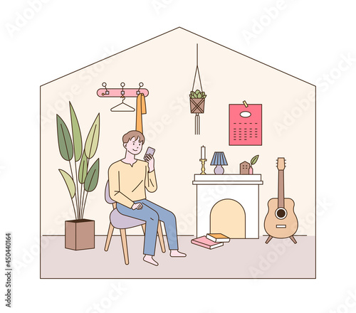 Modern living room interior. A man is sitting in a living room with a fireplace. outline simple vector illustration.