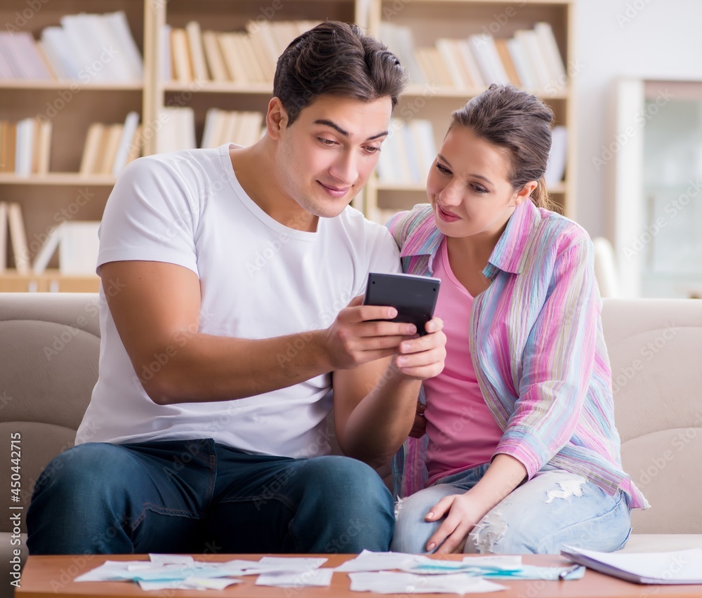 Young family discussing family finances Young family discussing family finances