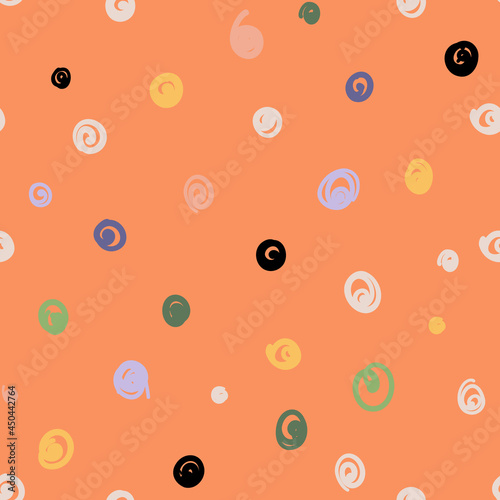 Hand-drawn polka dot seamless pattern for textile, wrapping paper print etc. Colorful doodle spots on orange background.