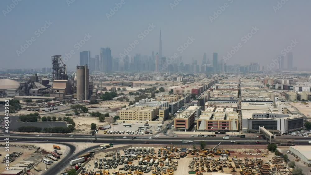 Aerial view of Dubai city from the Al Qouz industrial area, Burj Khalida and Dubai skyline on a bright summer day in the United Arab Emirates. 4K Footage Aerial view of Dubai city from the Al Qouz industrial area, Burj Khalida and Dubai skyline on a bright summer day in the United Arab Emirates. 4K Footage