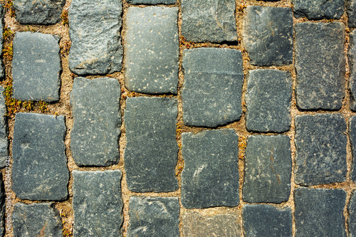 gray old cobblestone pavement  top view  background of the square
