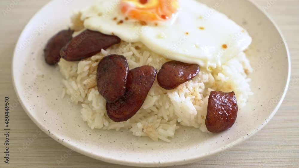rice with fried egg and Chinese sausage - Homemade food in Asian style rice with fried egg and Chinese sausage - Homemade food in Asian style