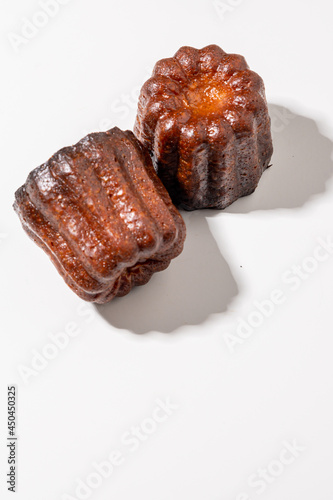 Canneles de bordeaux ,Traditional French sweet dessert,food concept. photo