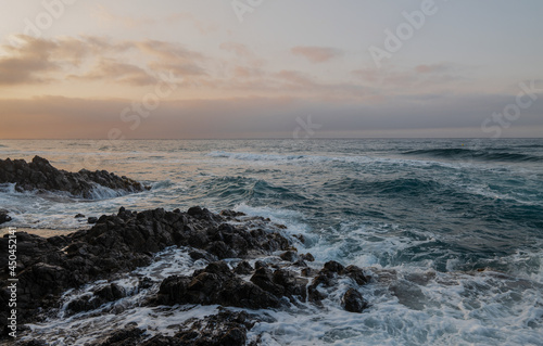 Landscape of rock formation in Barronal beach in Cabo de Gata nature park, Spain, during sunrise