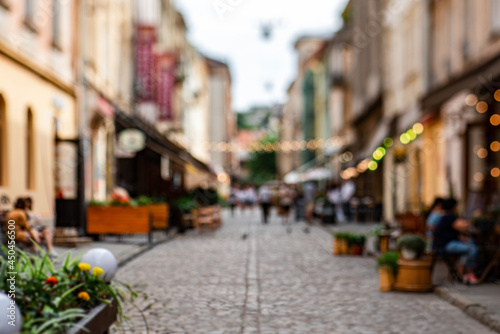 Unfocused cafes, buildings and people