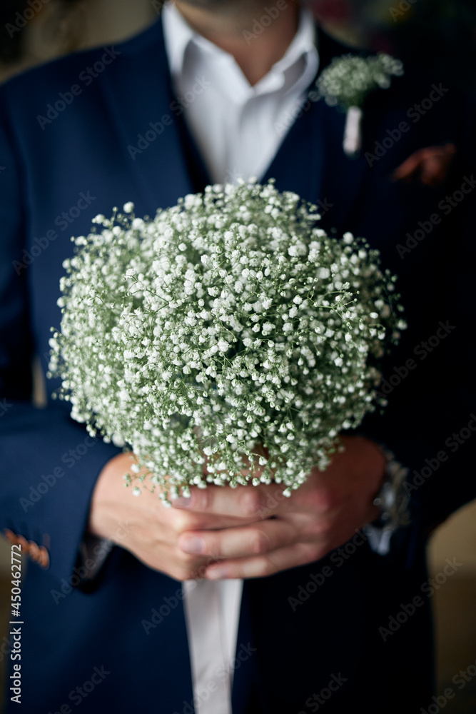 bride holding a bouquet of flowers bride holding a bouquet of flowers