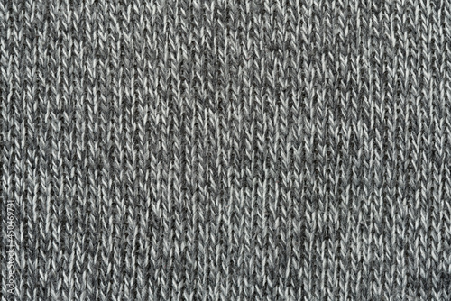 Seamless texture of knitted sweaters background. factory material texture