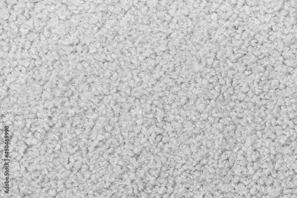 White curly wool seamless texture background. texture with short factory material. White curly wool seamless texture background. texture with short factory material.