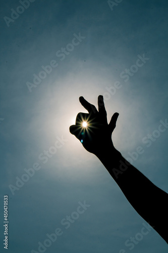 Sun caught in the hand