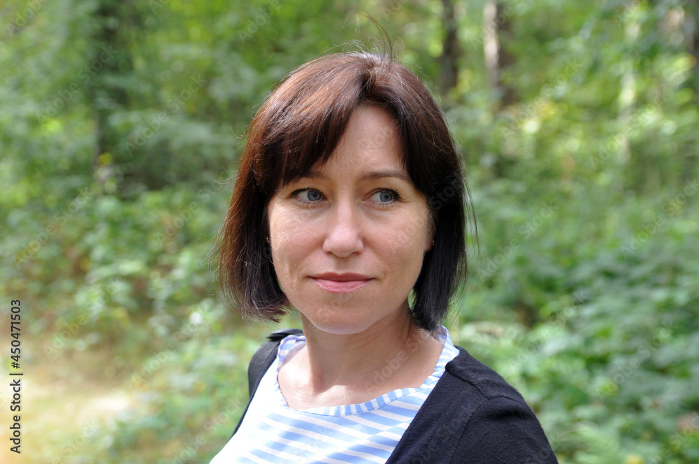 Portrait of a beautiful 40 year old European woman. Portrait of a beautiful 40 year old European woman.