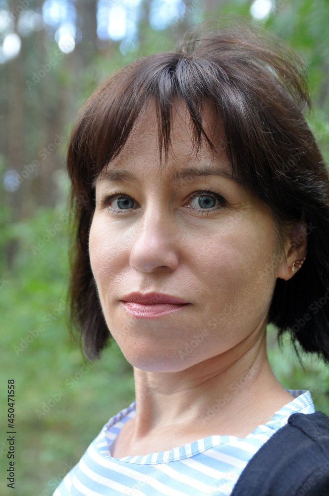 Portrait of a beautiful 40 year old European woman. Portrait of a beautiful 40 year old European woman.