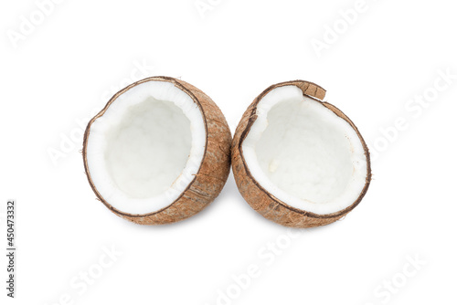 Two fresh sliced coconuts on an isolated white background