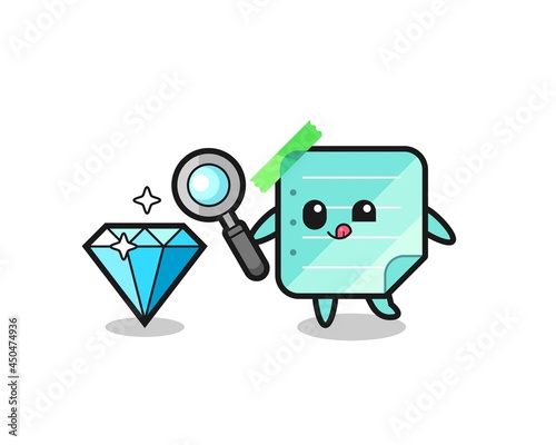 blue sticky notes mascot is checking the authenticity of a diamond