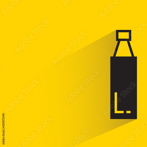 bottle with shadow on yellow background