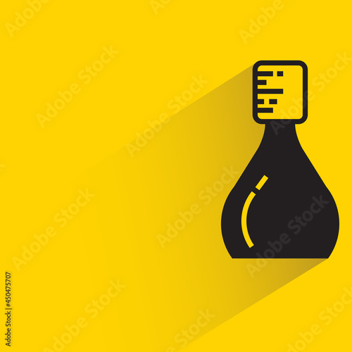 bottle with shadow on yellow background