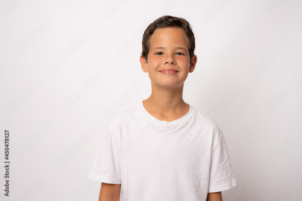 Photo of adorable young happy boy looking at camera. Photo of adorable young happy boy looking at camera.