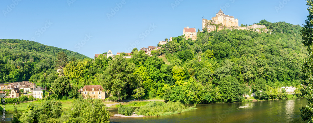 Panoramic view at the Castle of Castelnaud-la-Chapelle with village near Dordogne river - France