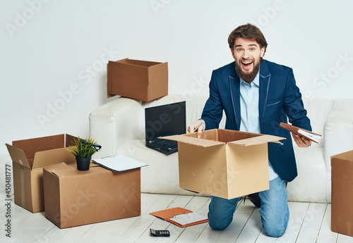 business man in the office boxes with things moving work © SHOTPRIME STUDIO