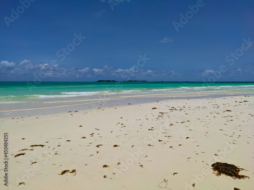 The white Pilar beach of the island Cayo Guillermo, Cuba with the azure water of the ocean. Playa Pilar is very popular with tourists and is one of the most popular excursions. photo