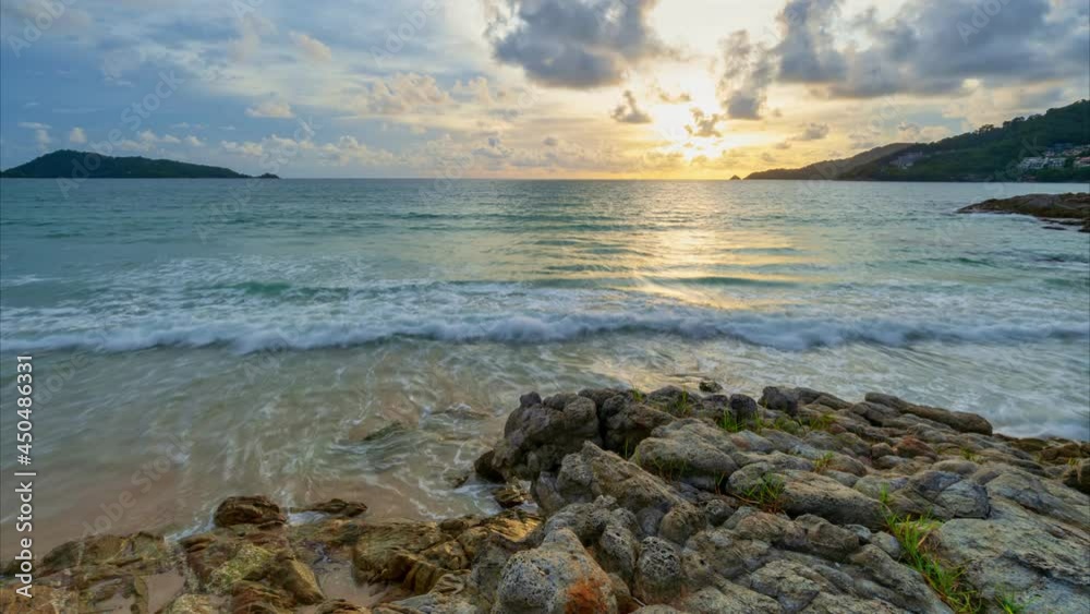 Landscape seashore under clear blue sky with clouds in the morning with waves crashing on rocks Amazing nature environment background Beautiful Phuket island Thailand Landscape seashore under clear blue sky with clouds in the morning with waves crashing on rocks Amazing nature environment background Beautiful Phuket island Thailand