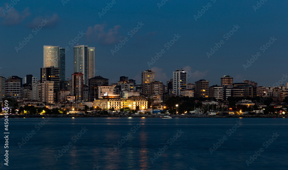 Obraz premium Modern buildings in Kadikoy district in Istanbul at night