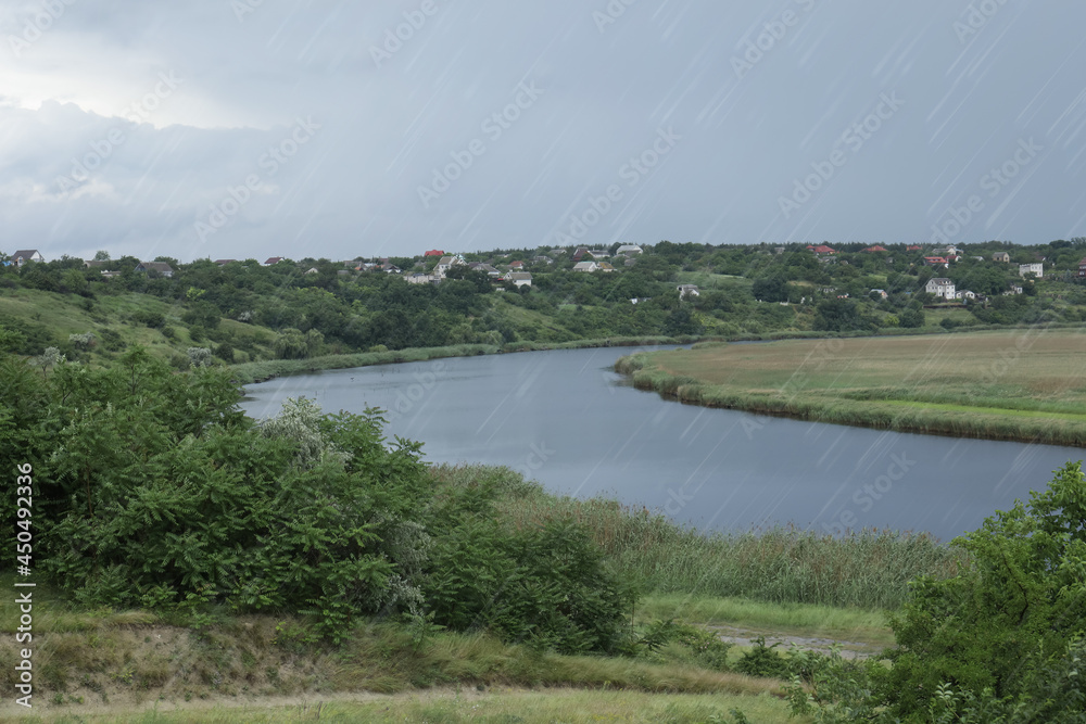 Beautiful view of river on grey day. Rainy weather Beautiful view of river on grey day. Rainy weather