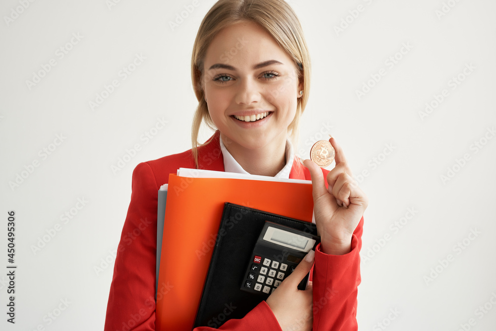 woman in red jacket cryptocurrency bitcoin financial calculator economy woman in red jacket cryptocurrency bitcoin financial calculator economy
