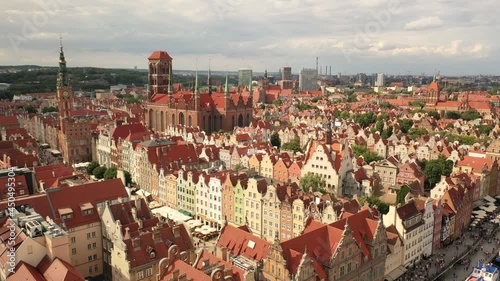 Gdansk, Poland,Europe.Beautiful panoramic aerial 4K video from drone to old city Gdansk, Motlawa river and Gothic St Mary church, city hall tower, the oldest medieval port crane (Zuraw) and old houses photo