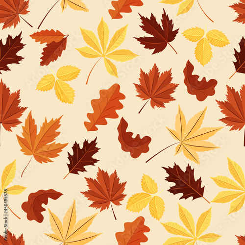 Vector seamless pattern with autumn leaves in orange, red, brown and yellow colors. Ideal for wallpaper, gift paper, fill drawings, web page backgrounds, autumn greeting cards.