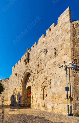 Zion Gate of Old City walls aside ancient City of David leading to Jewish Quarter of Jerusalem in Israel photo