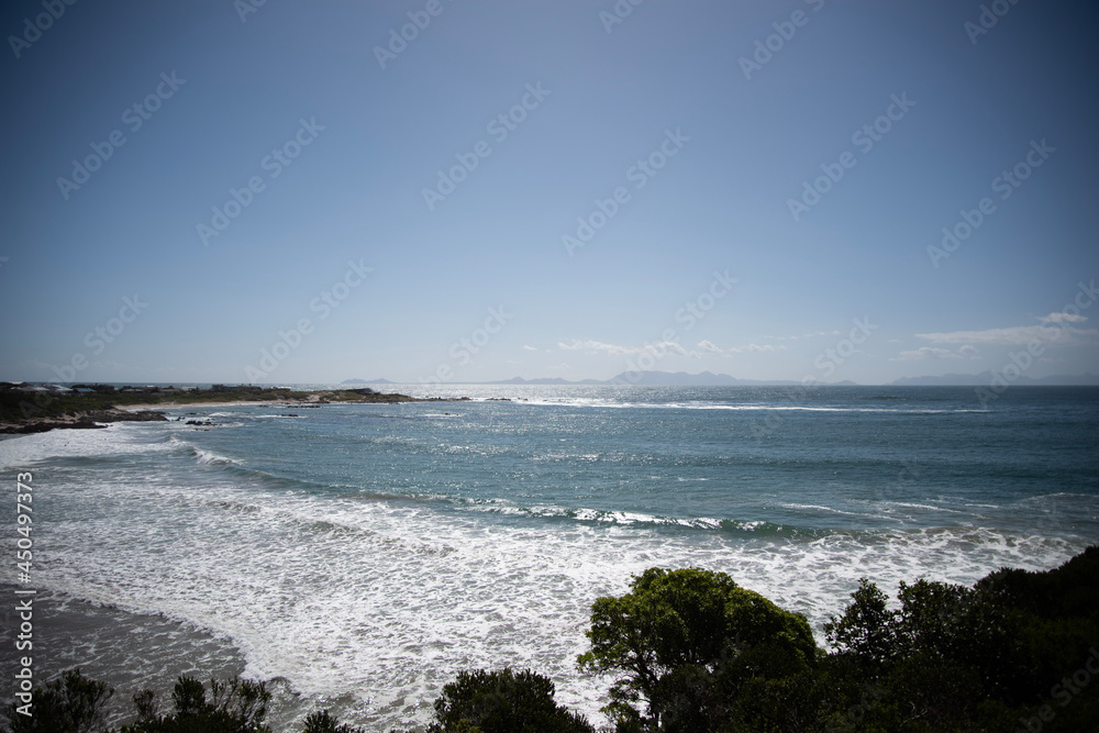 waves breaking on the beach