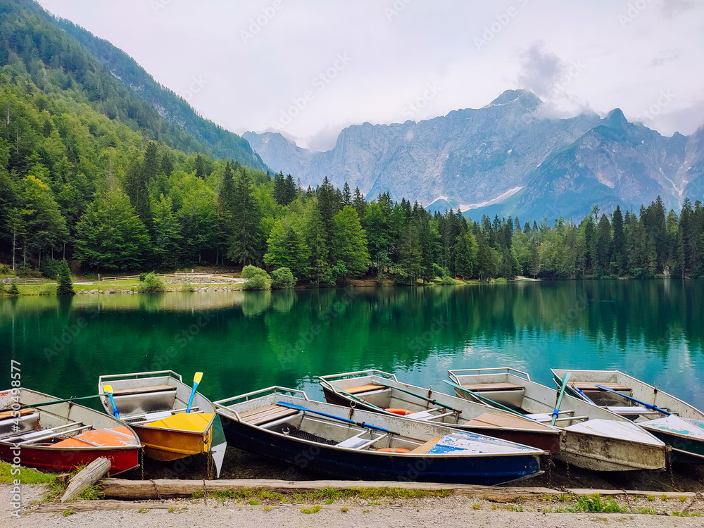 Boats on a mountain lake with a beautiful landscape.
