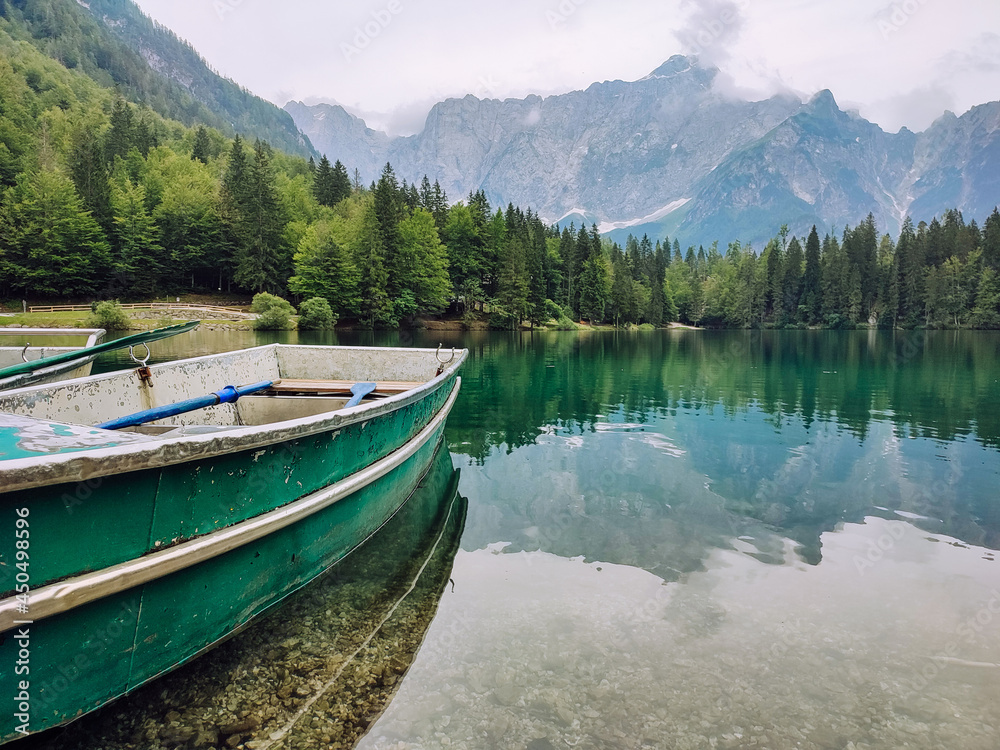 Boats on a mountain lake with a beautiful landscape.