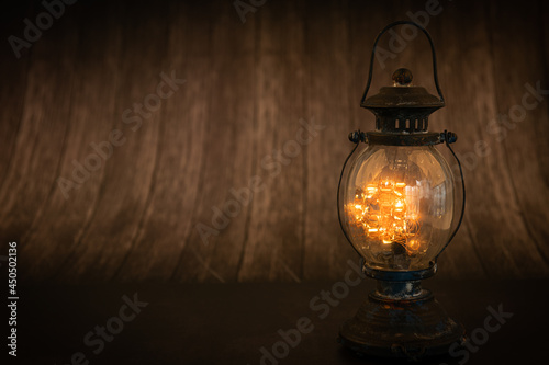 Vintage lamps are shining on the dark vintage tree floor.