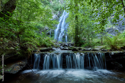 Fototapeta Naklejka Na Ścianę i Meble -  Large waterfall formed in the area of Galicia known as Las Hortas waterfall.
