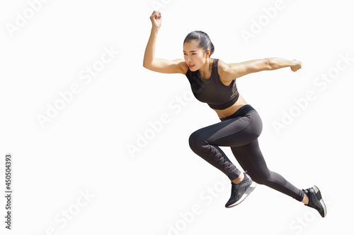 young asian fitness woman in sportwear  running  isolated on white background . excited runner , jumping  girl with copy space and  clipping path . fit female silhouette workout
