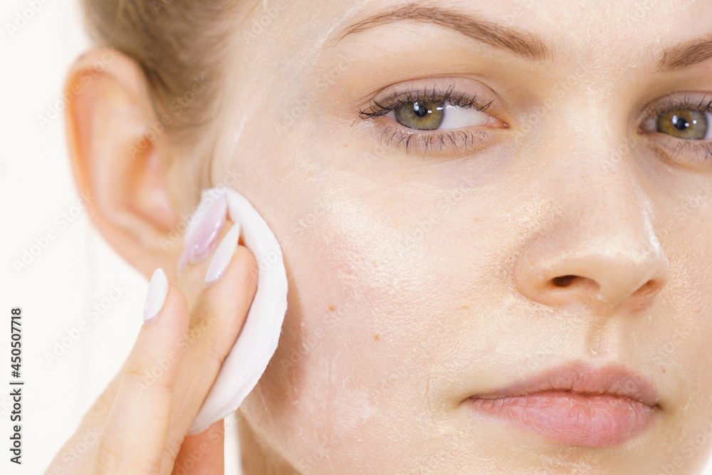 Girl removes mask cosmetic Girl removes mask cosmetic