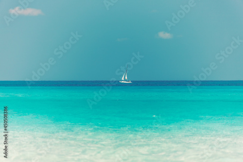 sailboat on the horizon, turquoise sea, beautiful landscape