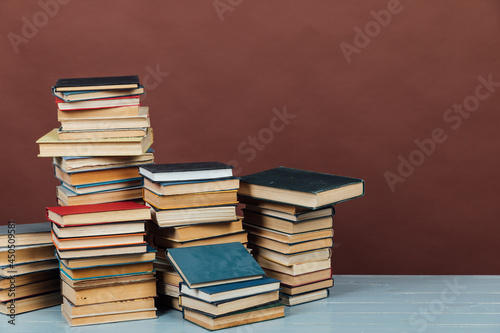 Stacks of Books for College School Library Training Brown Background