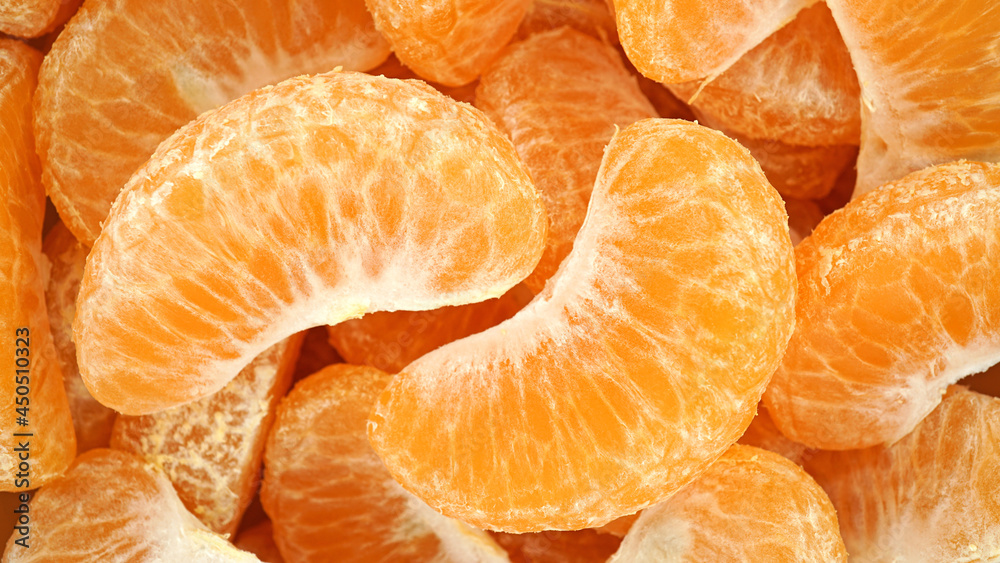 Heap of peeled tangerine segment fruit, Mandarin pieces vitamin C healthy organic fruit, Top view, Close up Heap of peeled tangerine segment fruit, Mandarin pieces vitamin C healthy organic fruit, Top view, Close up