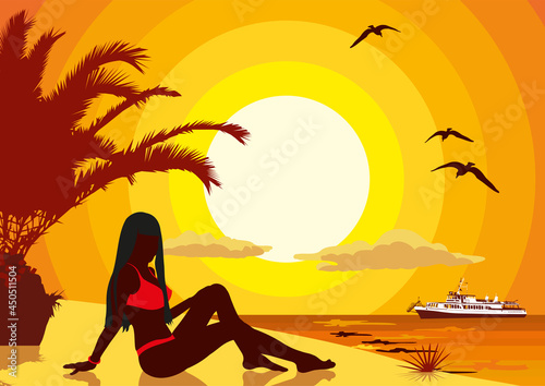 A girl in a swimsuit posing against the background of the sea sunset