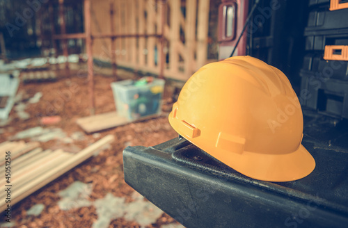 Hard Hat Laying on a Truck Cargo Bed photo