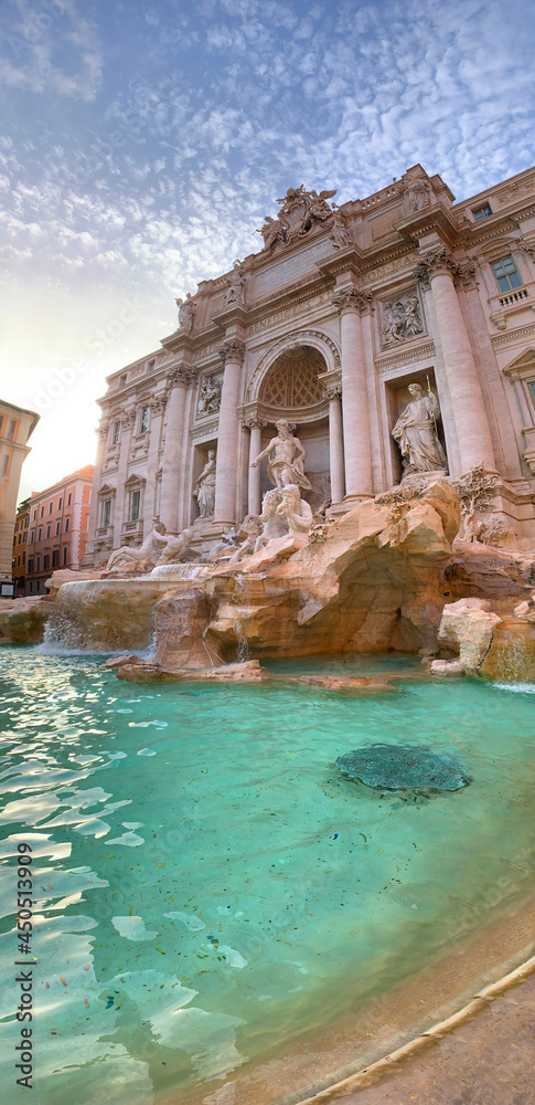 Trevi Fountain in Rome, Italy. Ancient fountain. Roman statues at piazza in old medieval city. Touristic destination for vacation.