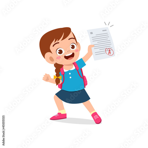 cute little boy feel happy because get good grade from exam