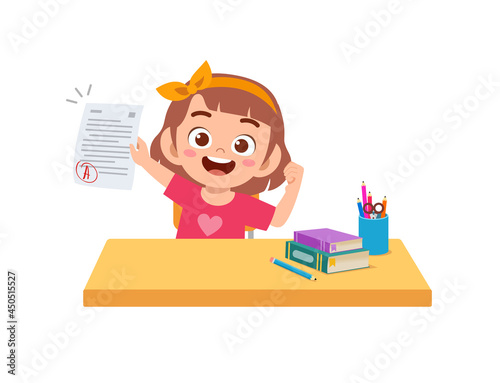cute little boy feel happy because get good grade from exam