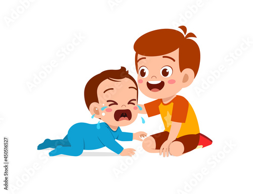 cute little boy try to comfort crying baby brother