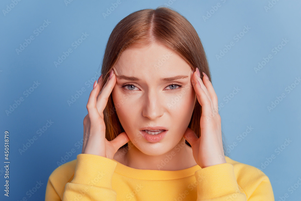 Portrait of exhausted sick lady fingers temples headache feel unwell on blue background Portrait of exhausted sick lady fingers temples headache feel unwell on blue background