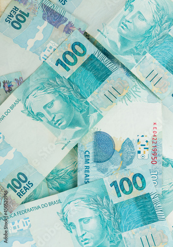 hundred reais bills background pattern. Brazilian money photo